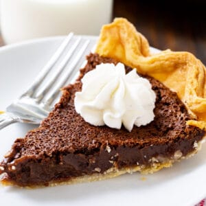 Slice of Chocolate Chess Pie on a plate.