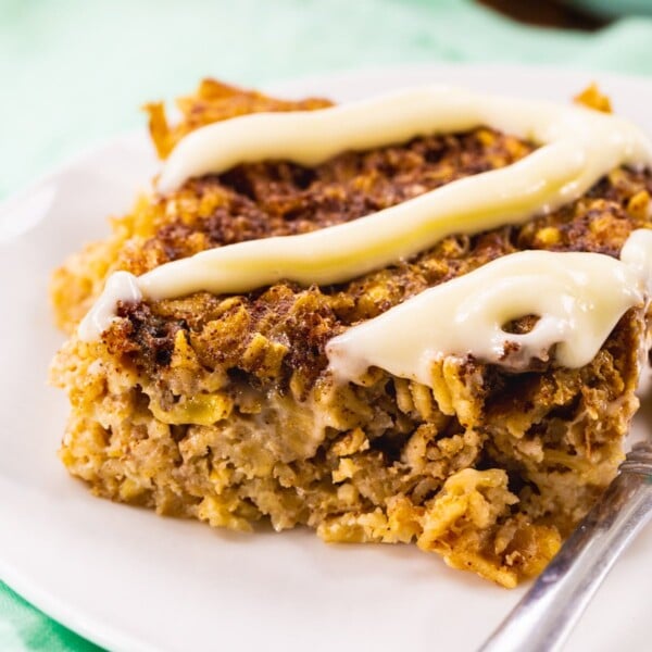 Square of Cinnamon Roll Baked Oatmeal on a plate.