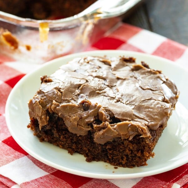 Slice of Classic Cocoa Cola Cake on a plate.