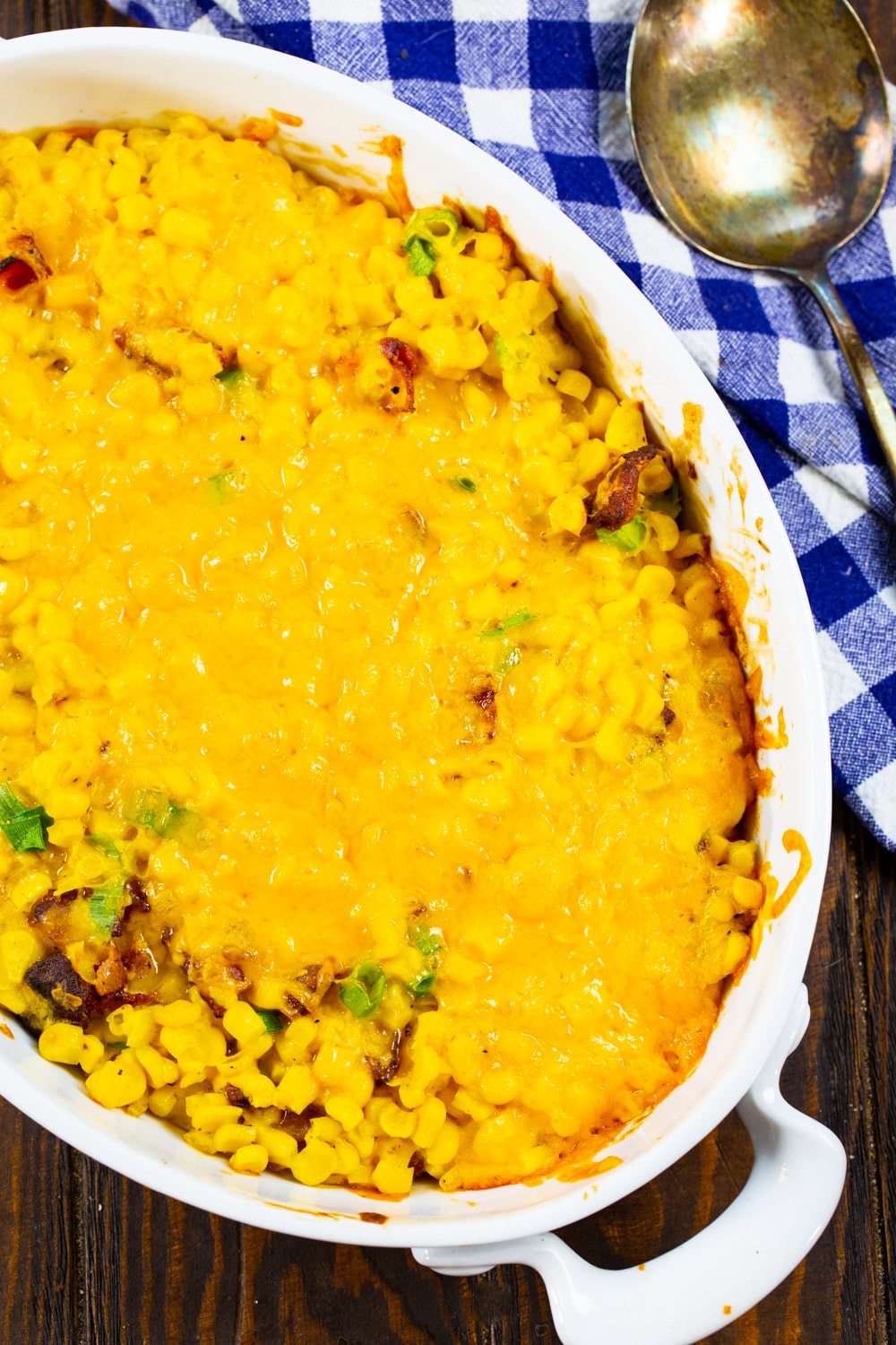 Corn Casserole with bacon in baking dish.