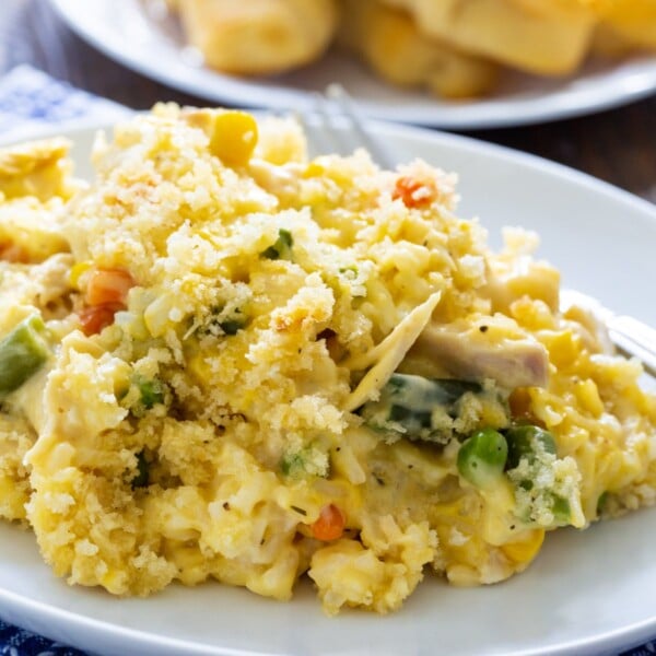 Creamy and Chicken Rice Casserole dished up on a plate.