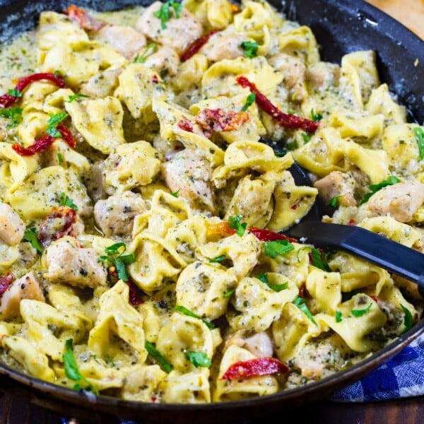 Creamy Pesto Chicken Tortellini in a large skillet.