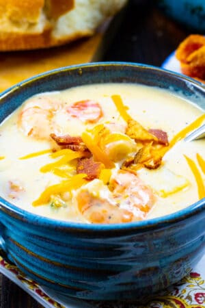 Creamy Potato Soup with Shrimp in a blue bowl.