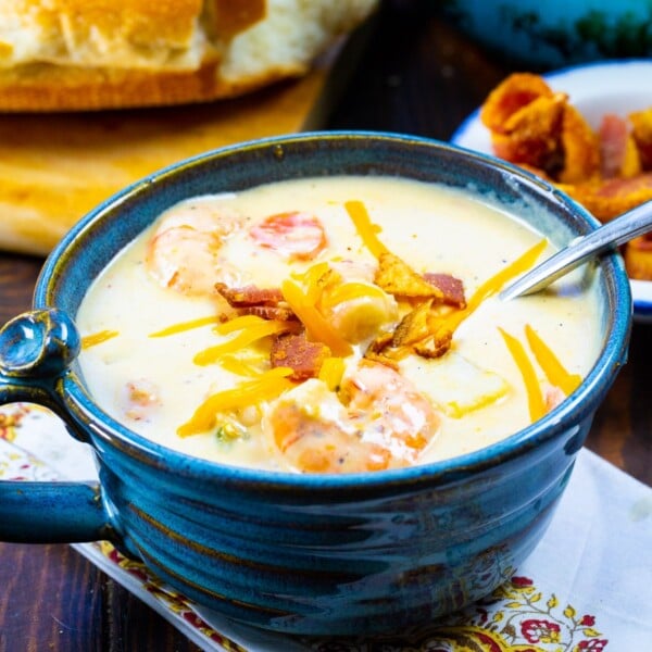 Creamy Potato Soup with Shrimp in a blue bowl.