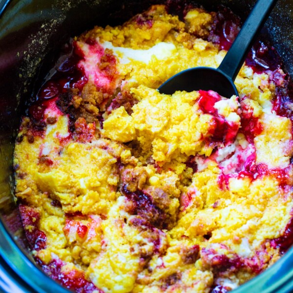 Crock Pot Cherries and Cream Dump Cake in slow cooker.