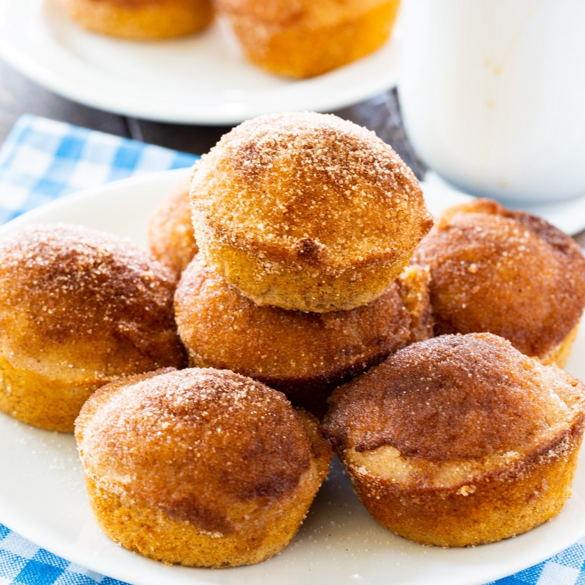 Old-Fashioned Doughnut Muffins piled up on a plate.