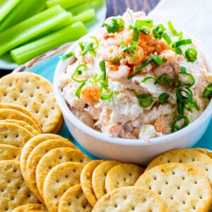 Easy Shrimp Spread in a bowl surrounded by crackers.