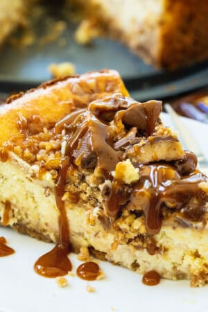 English Toffee Cheesecake slice on a plate.