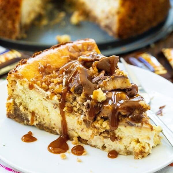 English Toffee Cheesecake slice on a plate.