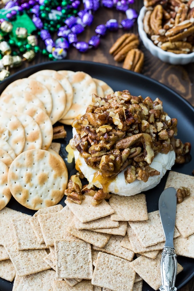French Quarter Pecan Cheese Spread. Praline sauce covers a delcious cream cheese disc.