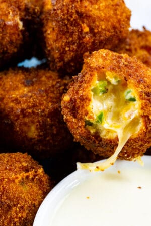 Fried Jalapeno Popper Bites with bite bitten out.