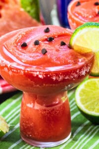 Frozen Watermelon Margaritas with mini chocolate chips on top.