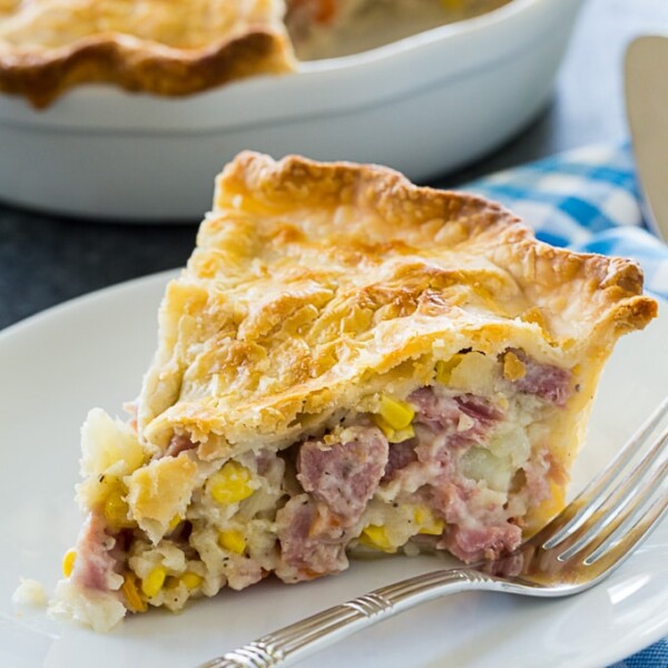 Ham Pot Pie slice on a white plate.