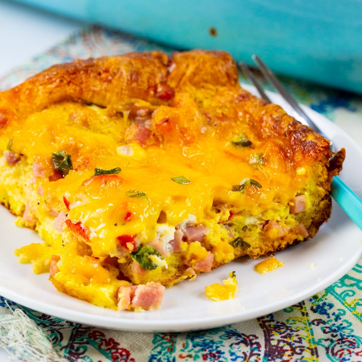 Slice of Ham and Cheese Crescent Casserole on a plate.