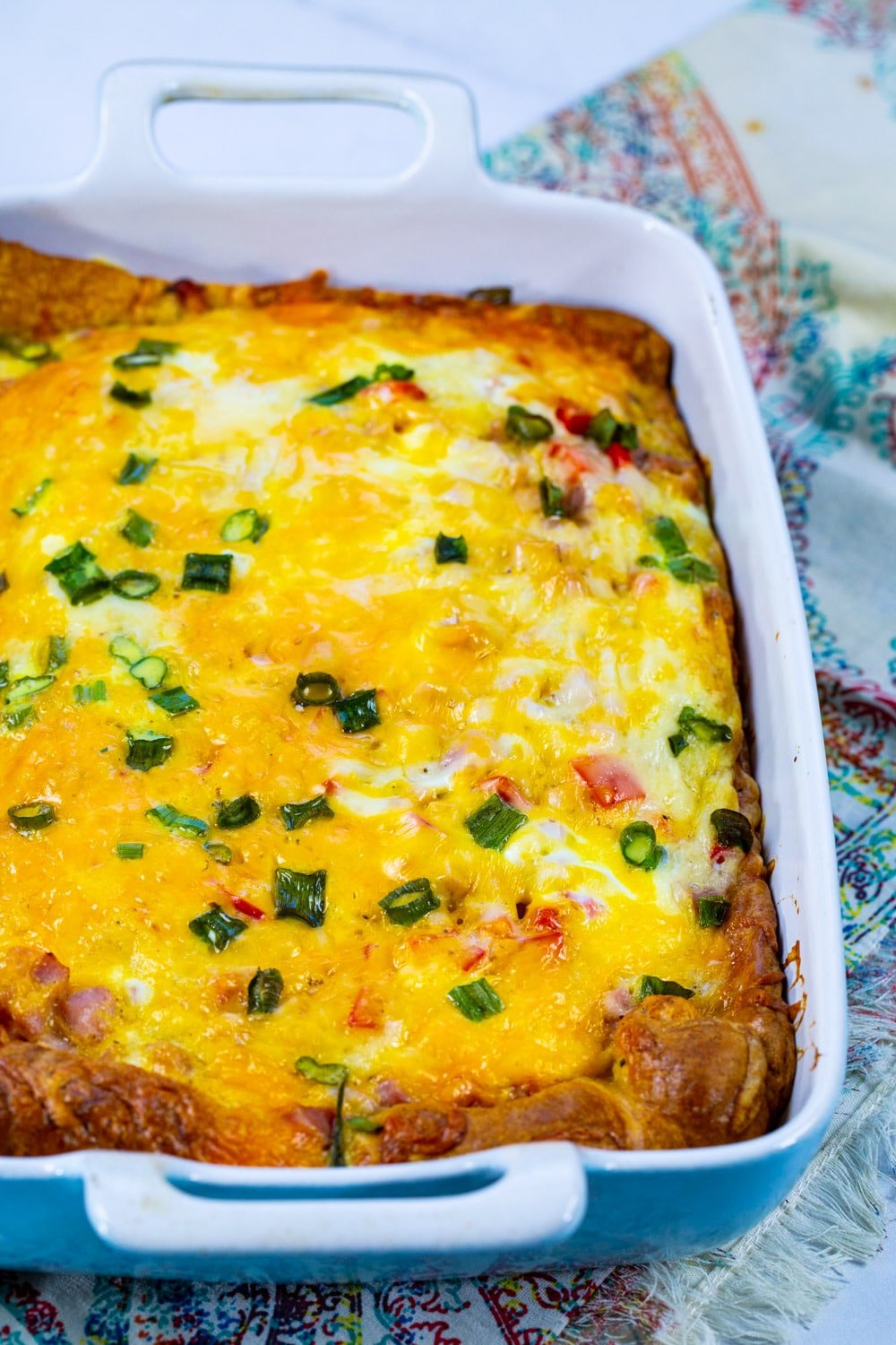 Whole Ham and Cheese Casserole in a baking dish.