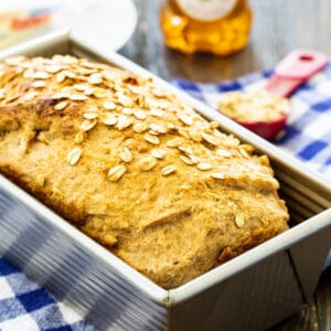 Honey Oat Wheat Bread in a loaf pan.