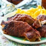 Instant Pot Country Style Ribs on plate with mac and cheese.