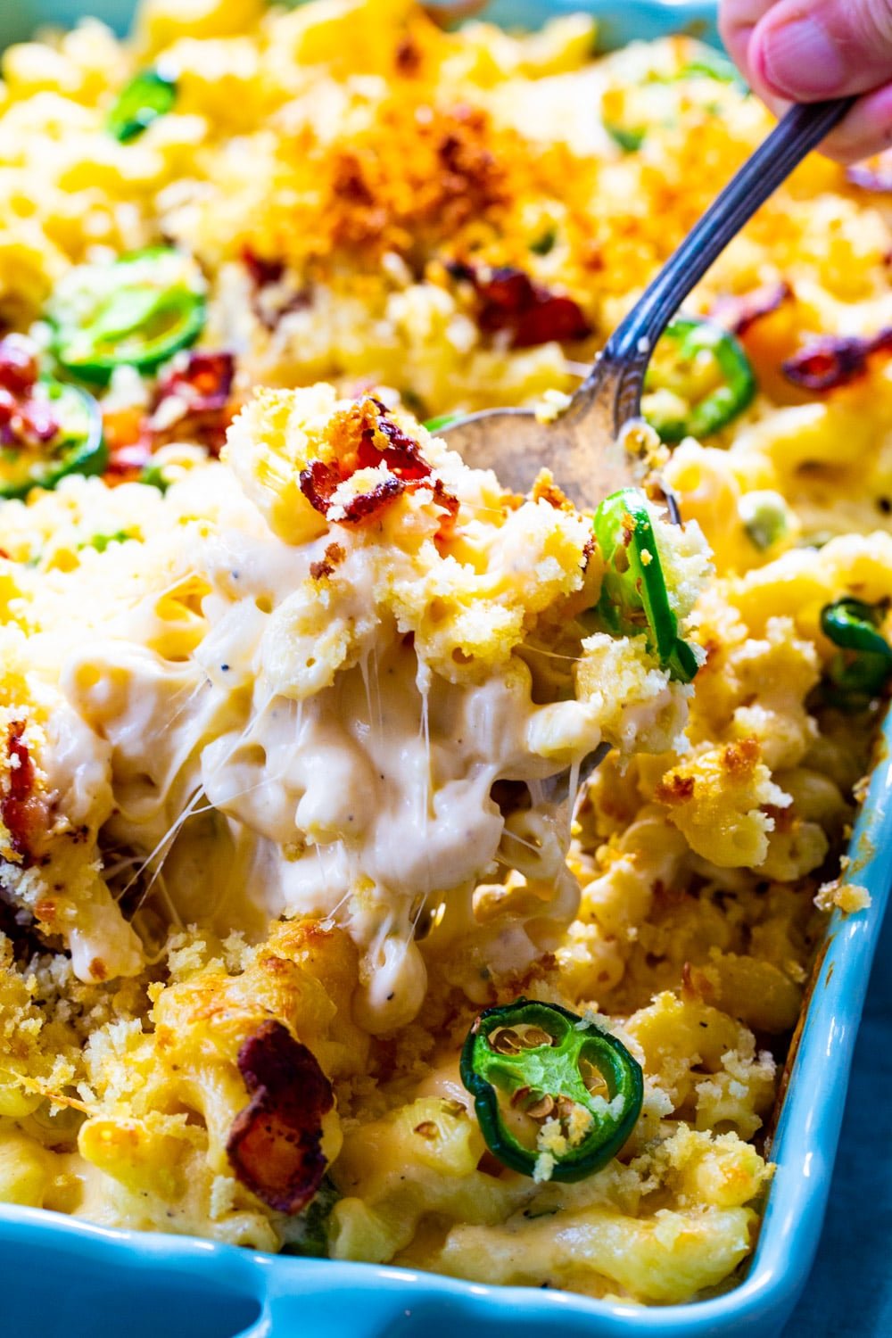 Spoon scooping Jalapeno Popper Mac and Cheese.