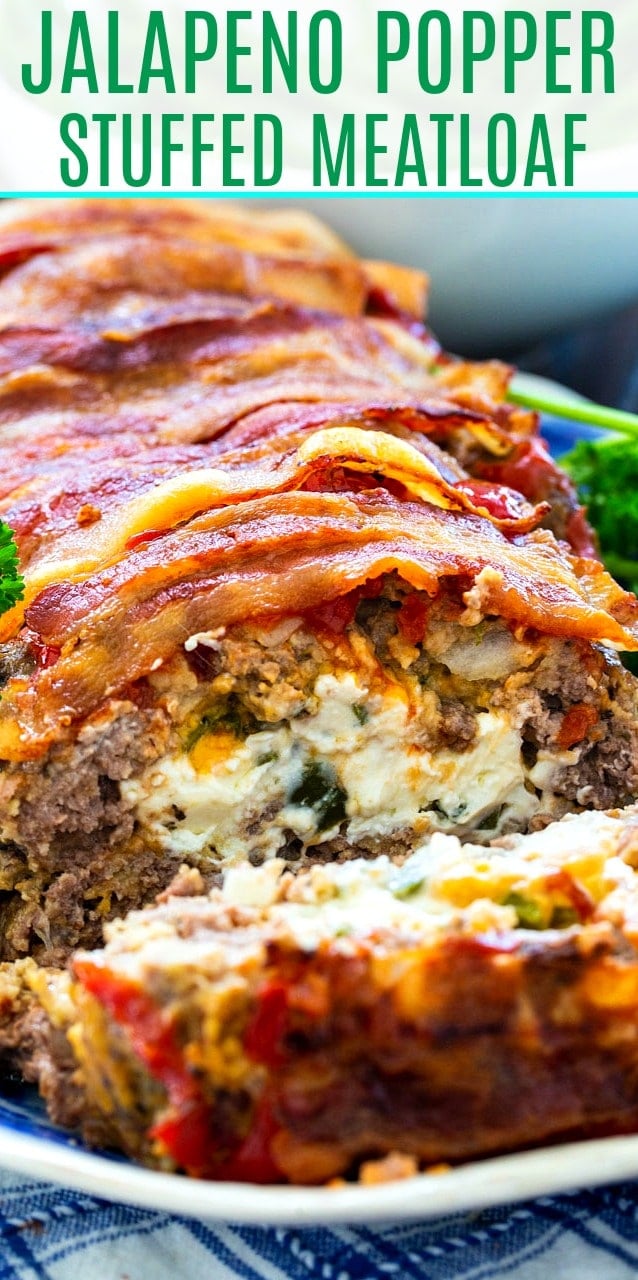 Jalapeno Popper Stuffed Meatloaf with one slice cut so the interior shows.
