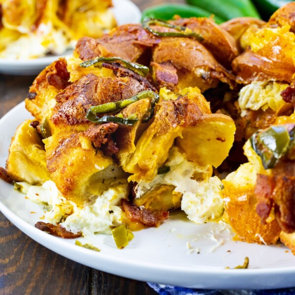 Jalapeno Popper Monkey Bread with a piece removed to show inside.