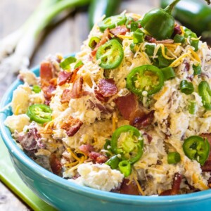 Jalapeno Popper Potato Salad in a blue serving bowl.