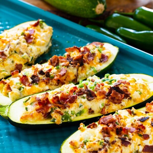 Jalapeno Popper Zucchini Boats on baking sheet.