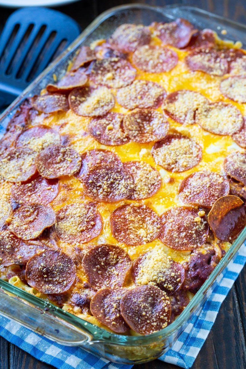 Casserole topped with pepperoni in baking dish.