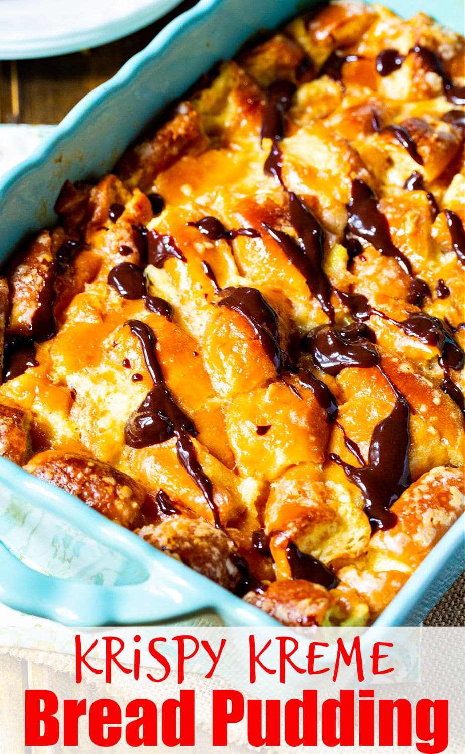 Bread Pudding topped with chocolate sauce.