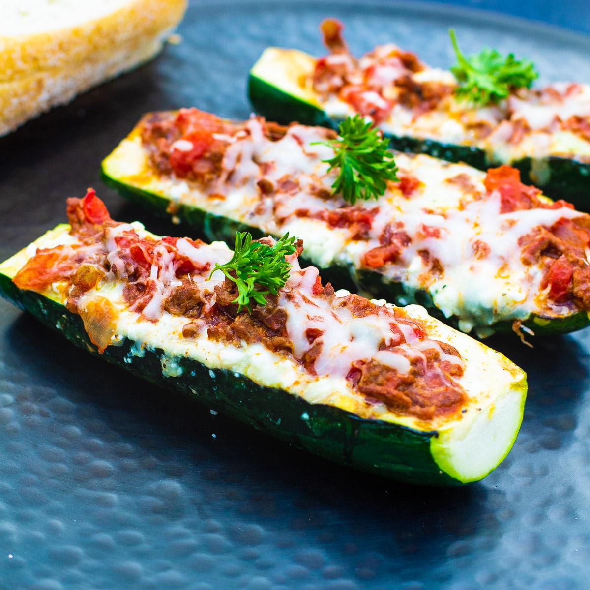 Three Zucchini Boats on a serving platter.