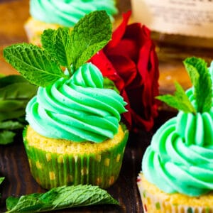 Mint Julep Cupcakes topped with mint sprigs.