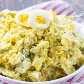 Mustard-Style Potato Salad in a white bowl.