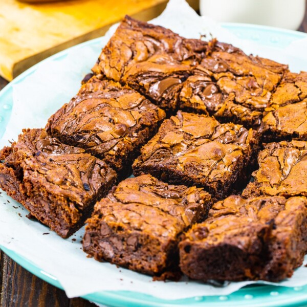 Nutella Brownies cut into squares on a plate.