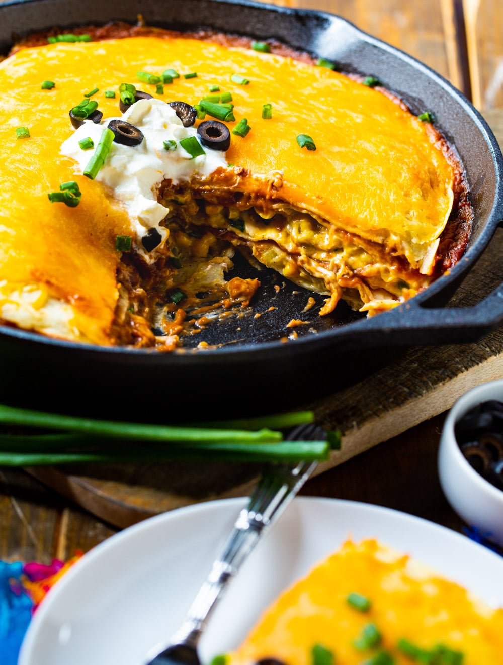 Chicken Tortilla Pie with a slice cut out.