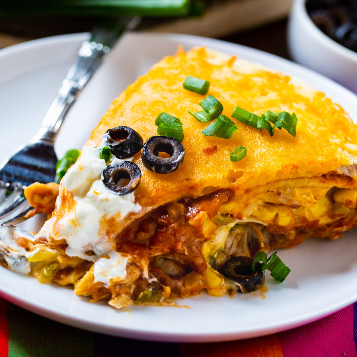 Slice of One Pot Chicken Tortilla Pie on a plate.