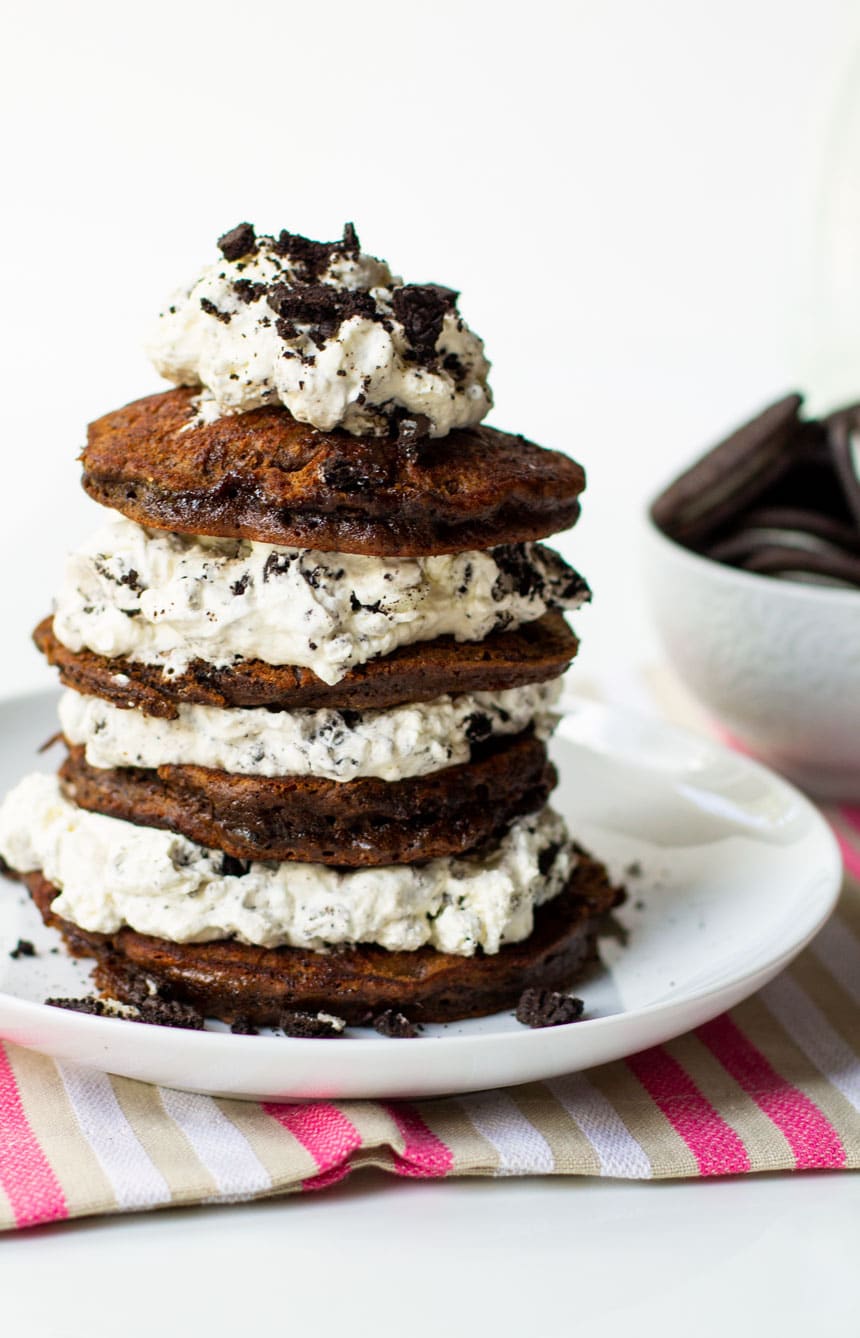 Double Stuff Oreo Pancakes stacked on a white plate.