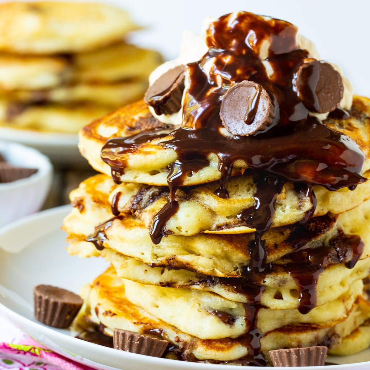 Stack of Peanut Butter Cup Pancakes on a plate.