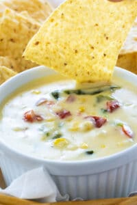 Poblano and Corn Queso with tortilla chips.