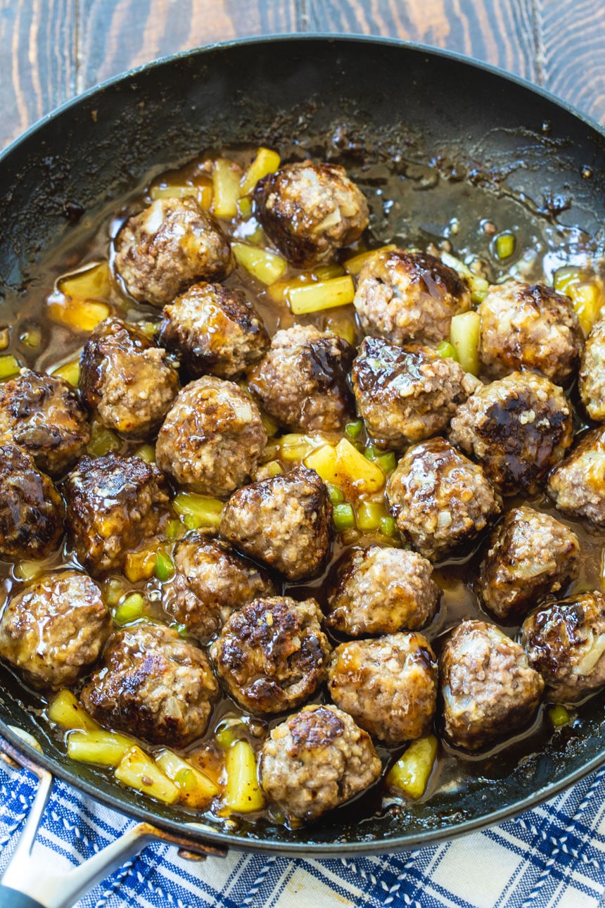 Meatballs with Polynesian Glaze in a nonstick skillet.
