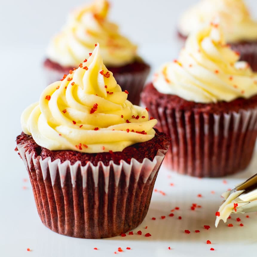 Close-up of cupcakes with red sprinkles.