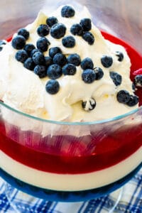 Red, White & Blue Jello Salad in a trifle bowl.