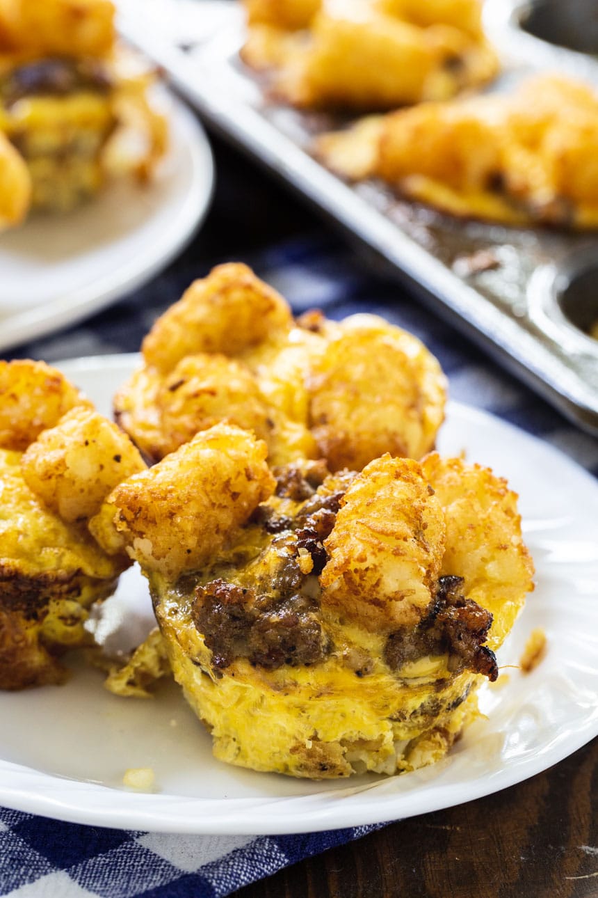 Sausage and Cheese Tater Tot Cups on a white plate.