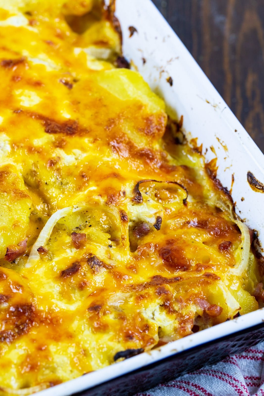 Scalloped Potatoes with Ham in a casserole dish.