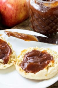 Close-up of Apple Butter on English muffins.