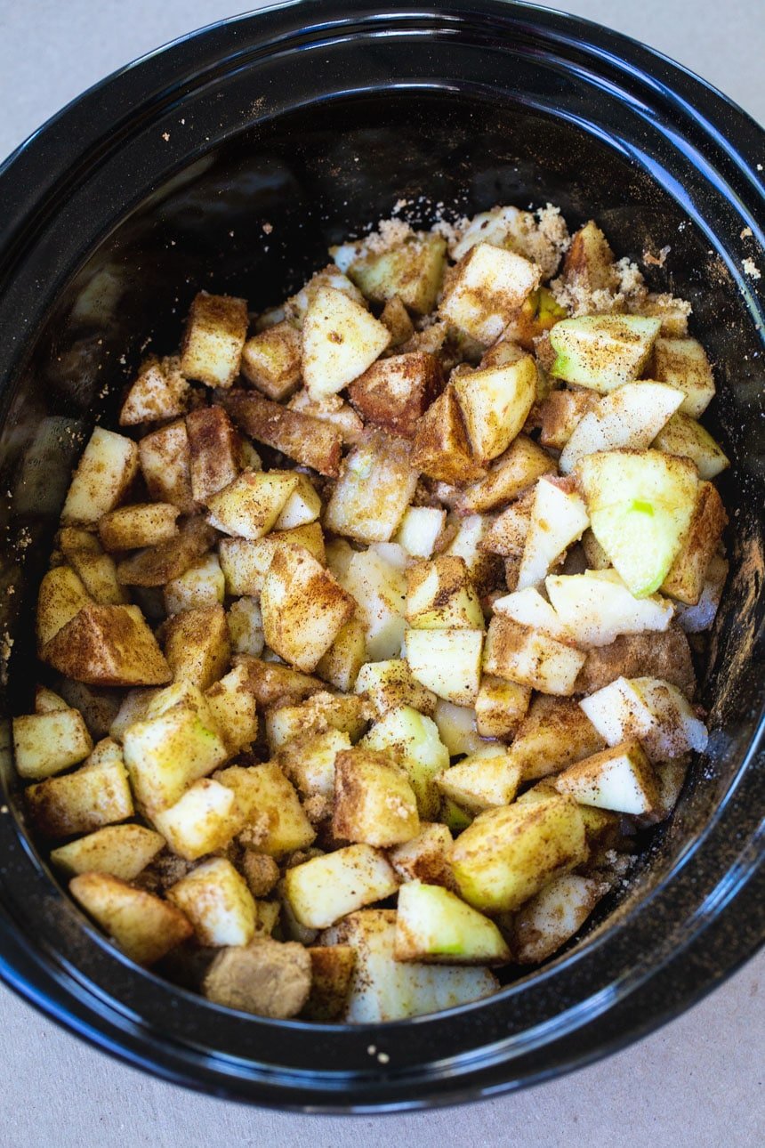 Chopped apples in crock pot.