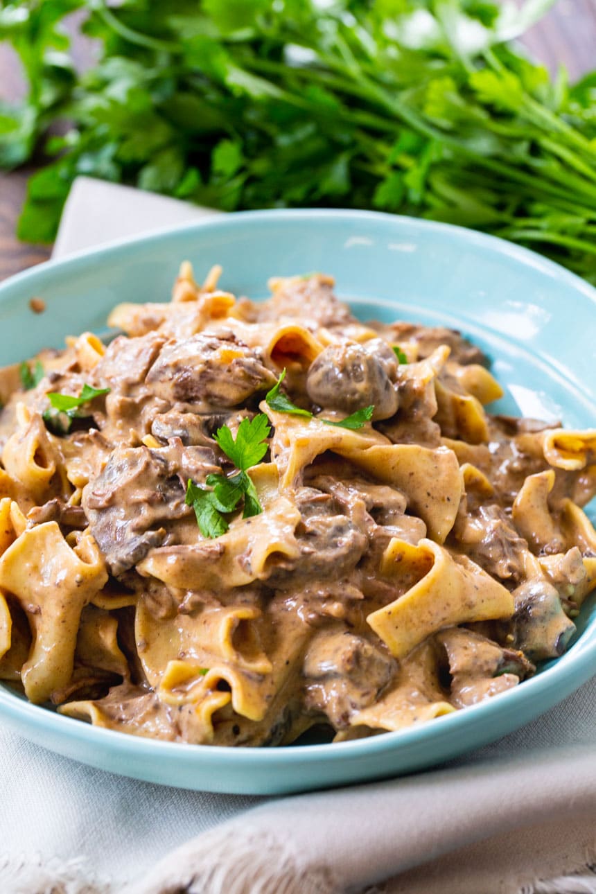Slow Cooker Beef Stroganoff in a blue bowl.