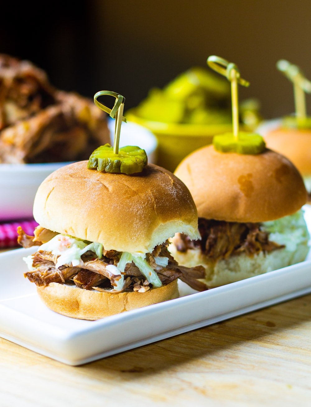 Carolina-Style Pulled Pork on slider buns with coleslaw.