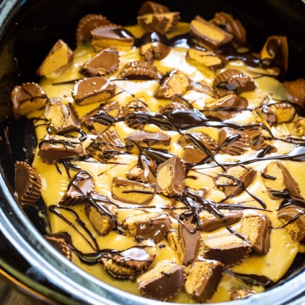 Chocolate Peanut BUtter Cake in a black slow cooker.