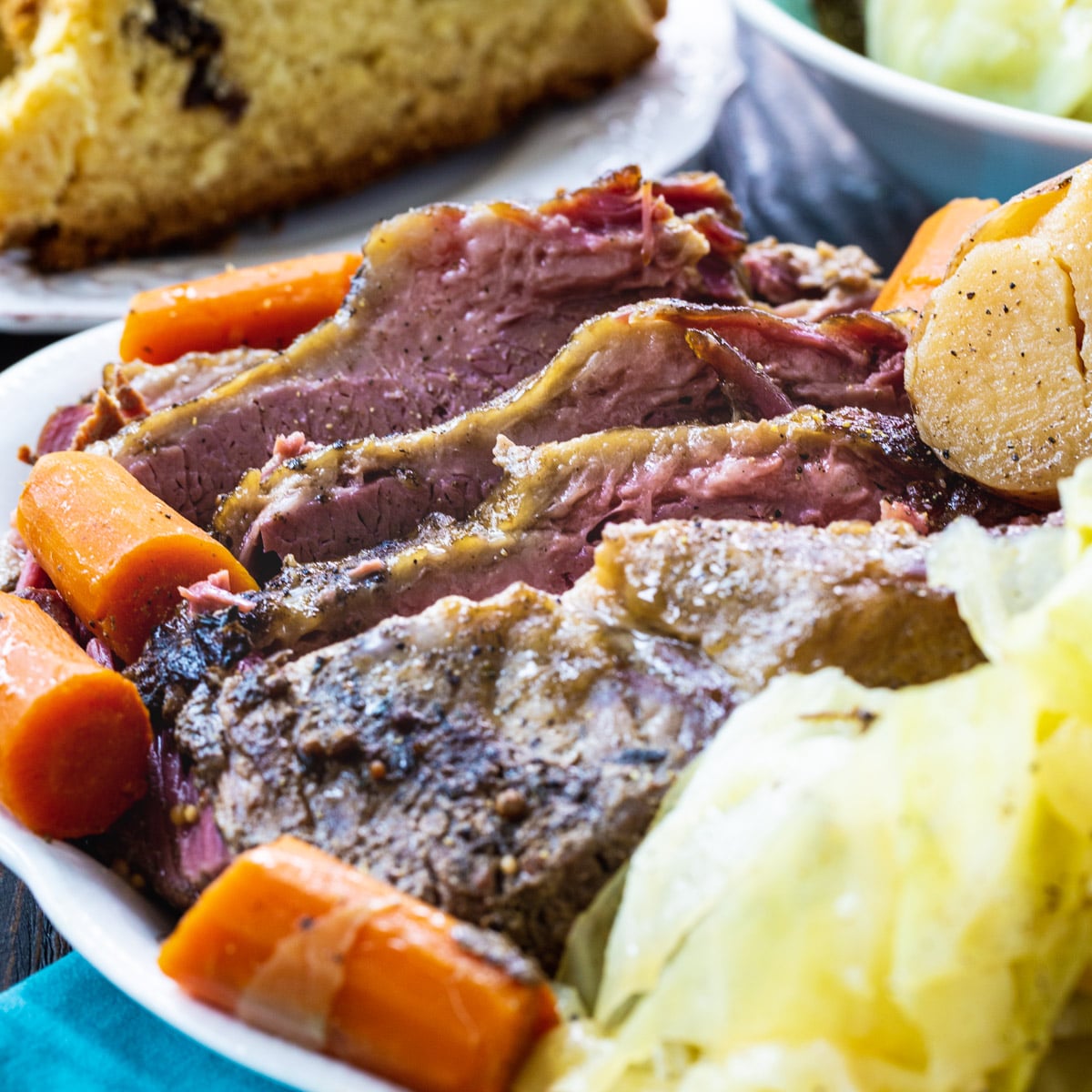 Slow Cooker Corned Beef and Cabbage on a serving platter.