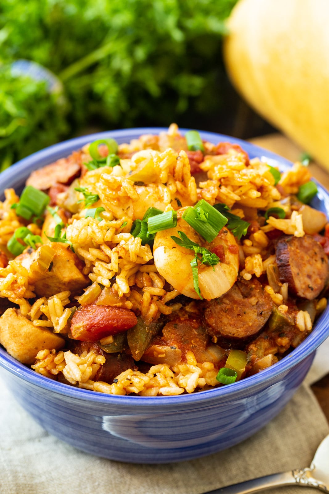 Slow Cooker Jambalaya in a blue bowl.