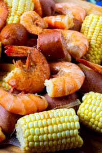 Slow Cooker Low Country Boil spread out on a table.